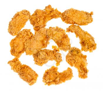 top view of many crispy batter deep-fried chicken wings isolated on white background