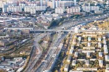 above view of roads and railways in Moscow city from observation deck at the top of OKO tower in autumn