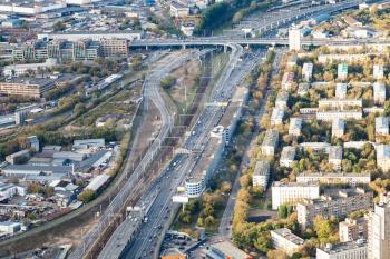 above view of urban roads and railroads in Moscow city from observation deck at the top of OKO tower in autumn