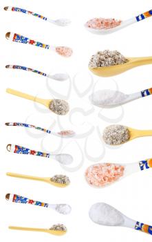 set from ceramic spoons with various salts isolated on white background