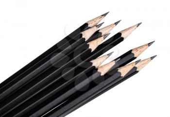 top of set of black graphite pencils close up isolated on white background