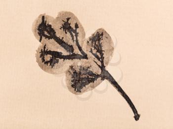 training drawing in sumi-e (suibokuga) style - oak leaf handpainted by black watercolors on yellow paper