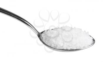 tablespoon with coarse grained Sea Salt close up isolated on white background