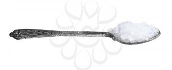 side view of silver salt spoon with coarse grained Sea Salt isolated on white background