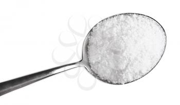 top view of tablespoon with grained Rock Salt close up isolated on white background
