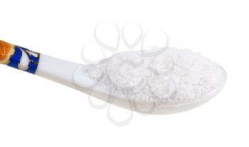 side view of chinese spoon with fine ground Sea Salt close up isolated on white background