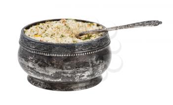 side view of old silver salt cellar with spoon with seasoned salt with dried vegetables and flavours isolated on white background