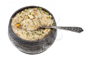 old silver salt cellar with spoon with seasoned salt with dried vegetables and flavours isolated on white background