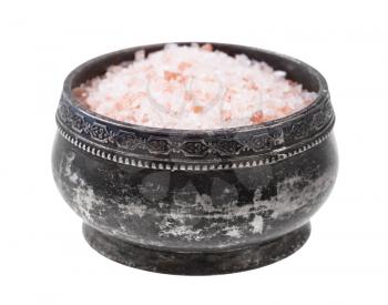 side view of old silver salt cellar with pink Himalayan Salt isolated on white background