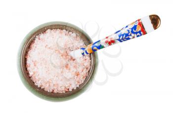 top view of ceramic salt cellar with spoon with pink Himalayan Salt isolated on white background