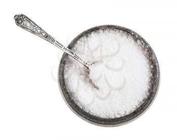top view of old silver salt cellar with spoon with grained Rock Salt isolated on white background