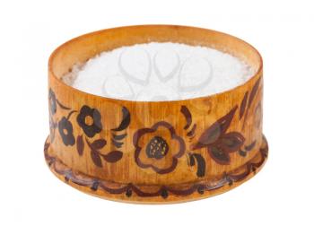 side view of wooden salt cellar with grained Rock Salt isolated on white background