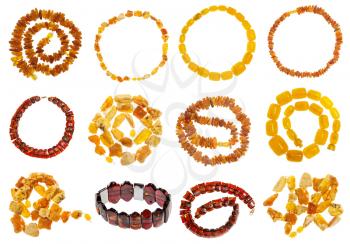 set of various amber necklaces isolated on white background