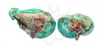 closeup of sample of natural mineral from geological collection - pebbles of Malachite rock isolated on white background