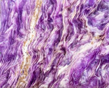 background from polished natural purple Charoite rock close up
