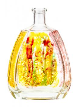 glass painting - hand painted glass brandy bottle with floral ornament isolated on white background