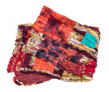 folded stitched red brown patchwork scarf isolated on white background
