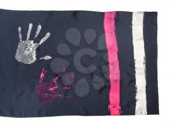 detail of handcrafted black silk scarf with handpainted handprints isolated on white background