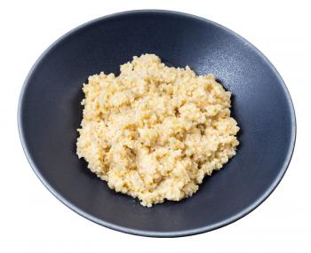 cooked porridge from crushed polished wheat in gray bowl isolated on whitte background