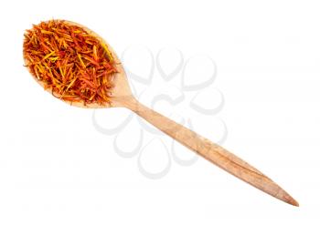 top view of dried safflower petals in wood spoon isolated on white background