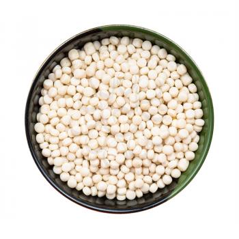 top view of israeli pearl couscous in round bowl isolated on white background