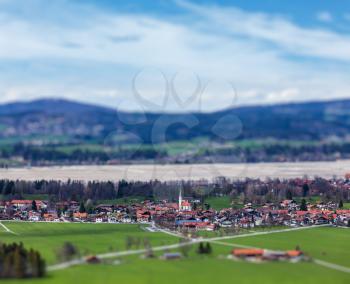 German countryside and village with tilt shift toy effect shallow depth of field. Bavaria, Germany