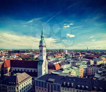 Vintage retro effect filtered hipster style travel image of aerial view of Munich and St. Peter Church  - Marienplatz and Altes Rathaus, Bavaria, Germany