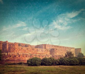 Vintage retro hipster style travel image of Agra Fort with grunge texture overlaid. Agra, Uttar Pradesh, India