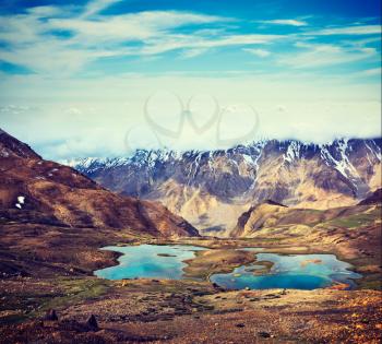 Vintage retro effect filtered hipster style travel image of mountain lakes in Spiti Valley in Himalayas. Himachal Pradesh, India