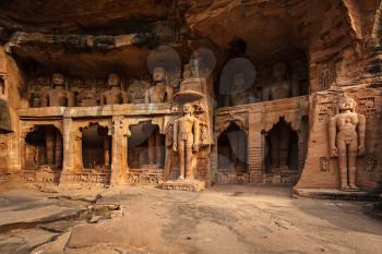 Rockcut Statues of Jain thirthankaras in rock niches near Gwalior fort. Gwalior, Madhya Pradesh, India