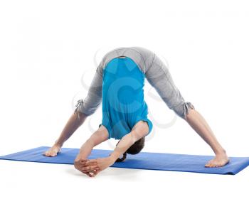 Yoga - young beautiful woman  yoga instructor doing Wide Legged Forward Bend C pose (Prasarita Padottanasana C) exercise isolated on white background