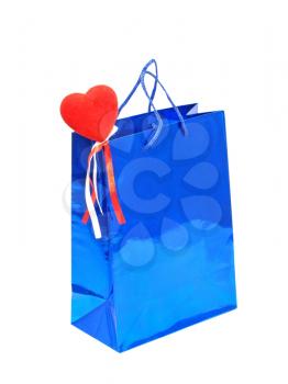 A Valentines Day holiday gift bag with red heart isolated on a white background.