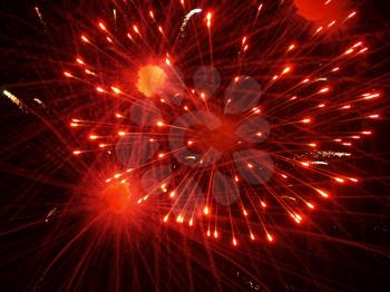 Shining Fireworks Bursts in a Darkness as Abstract Background.