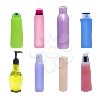 Set of multicolored plastic cosmetic containers isolated on white background.