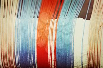 Multicolored thread taken closeup.Toned image.