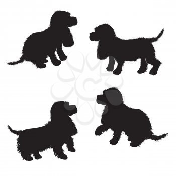 Set of black dogs silhouette isolated on white background, puppy, spaniel breed.
