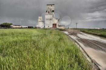 Prairie Grain Elevator in Saskatchewan Canada with storm clouds