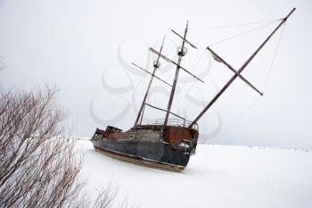 Old Abandoned rusty Sailboat on Lake Ontario Canada