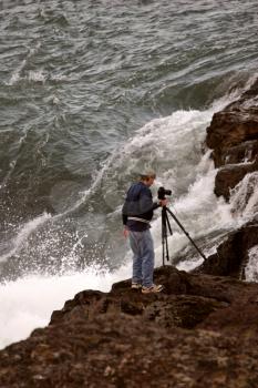 Photographer shooting rapids on Buckley River in B.C.