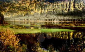 Reflection on Bell Lake during British Columia autumn