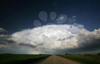 Storm clouds over Saskatchewan country road