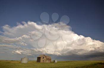 Storm clouds over Saskatchewan homestead