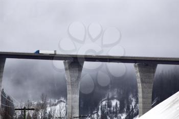 Transport Truck on Bridge in Winter Canada
