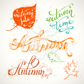 Grunge colourful words and leaves isolated on white background. Paint stains. Autumn. Autumn Sale. Autumn Time. 