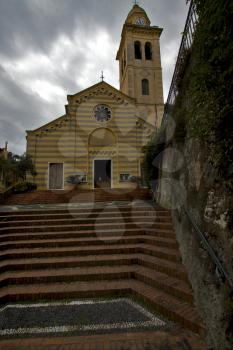 the colored facade  in the old church chiavari italy divo martino