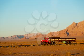 in iran blur mountain and landscape from the window  of a car