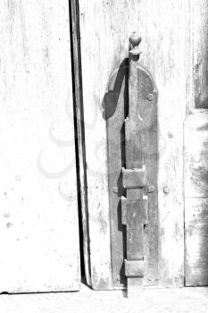blur in  italy antique door entrance and      decorative handle for background