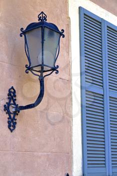 grey window   jerago    palaces italy   abstract  sunny day    wood venetian blind in the concrete  brick  
