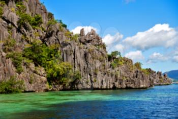 blur from a boat  in  philippines  snake island near el nido palawan beautiful panorama coastline sea and rock 