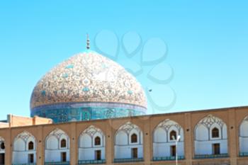 blur in iran   the old square of isfahan prople garden tree heritage tourism and mosque
